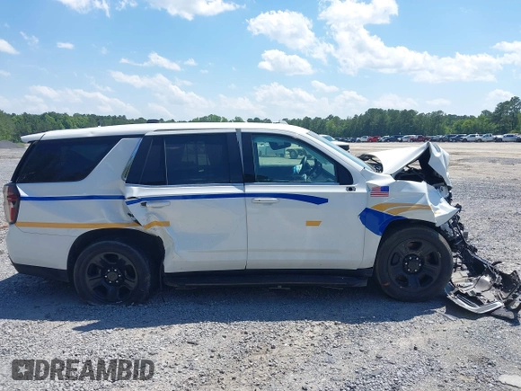 2022 Chevrolet Tahoe Commercial z VIN 1GNSCLED4NR222340, wystawiony jako IAAI lot #42321388 z przebiegiem Nie podano mil oraz . Historia ofert i sprzedaży dostępna na DreamBid. Obrazek 13.