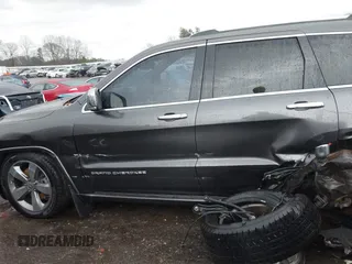 2014 Jeep Grand Cherokee Overland with VIN 1C4RJFCT2EC146239, listed as a IAAI auction lot 41368514 with 164,239 mi miles. Bid and sale history available at carsss.com. Image 14.