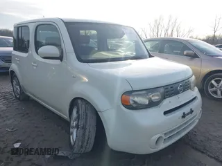 2010 Nissan Cube S z VIN JN8AZ2KR9AT151473, wystawiony jako IAAI lot #41125580 z przebiegiem 143 957 mil mil oraz . Historia ofert i sprzedaży dostępna na DreamBid. Obrazek 1.