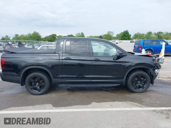 2023 Honda Ridgeline Black Edition with VIN 5FPYK3F86PB015746, listed as a IAAI auction lot 42311862 with 40,181 mi miles and . Bid and sale history available at DreamBid. Image 14.