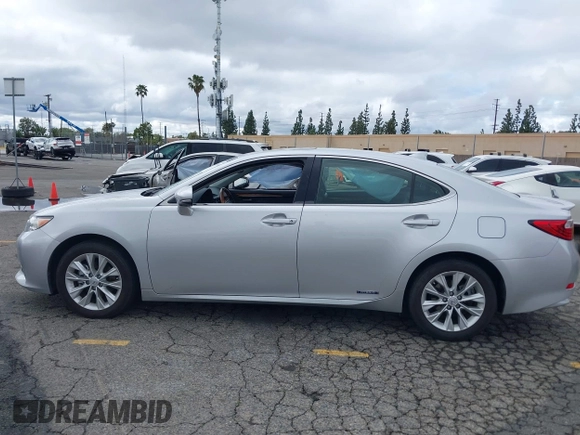 2015 Lexus ES 300h with VIN JTHBW1GG1F2084938, listed as a IAAI auction lot 41761844 with 69,854 mi miles and . Bid and sale history available at DreamBid. Image 14.
