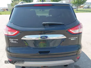 2015 Ford Escape Titanium with VIN 1FMCU9J96FUB58519, listed as a IAAI auction lot 42429369 with 125,541 mi miles and . Bid and sale history available at DreamBid. Image 16.