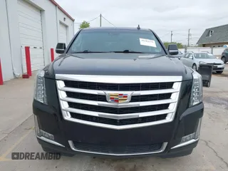 2018 Cadillac Escalade Premium Luxury z VIN 1GYS4CKJ1JR279129, wystawiony jako IAAI lot #42183231 z przebiegiem 130 086 mil mil oraz . Historia ofert i sprzedaży dostępna na DreamBid. Obrazek 13.