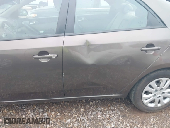 2013 Kia Forte EX with VIN KNAFU4A25D5719014, listed as a IAAI auction lot 42079529 with 222,801 mi miles. Bid and sale history available at carsss.com. Image 6.