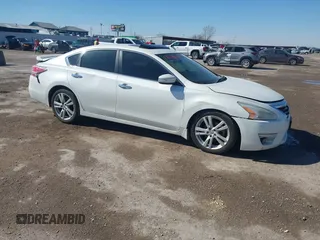 2015 Nissan Altima S z VIN 1N4BL3AP7FC436368, wystawiony jako IAAI lot #41609849 z przebiegiem 228 598 mil mil oraz . Historia ofert i sprzedaży dostępna na DreamBid. Obrazek 13.