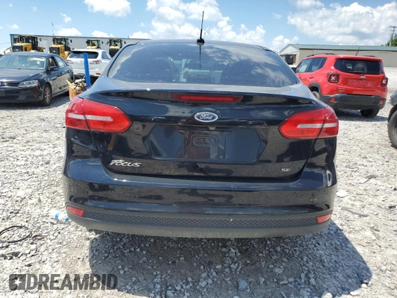 2018 Ford Focus SE z VIN 1FADP3F22JL265175, wystawiony jako Copart lot #62916255 z przebiegiem 90 348 mil mil oraz Szkoda całkowita • Salvage title. Historia ofert i sprzedaży dostępna na DreamBid. Obrazek 6.