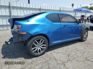 2014 Scion tC z VIN JTKJF5C72E3069652, wystawiony jako Copart lot #59791195 z przebiegiem 178 938 mil mil oraz Szkoda całkowita • Salvage title. Historia ofert i sprzedaży dostępna na DreamBid. Obrazek 3.