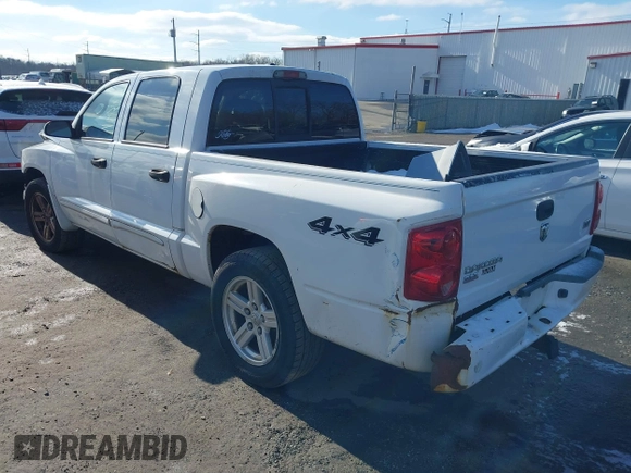 2007 Dodge Dakota SLT z VIN 1D7HW48JX7S166780, wystawiony jako IAAI lot #41375942 z przebiegiem 148 778 mil mil oraz . Historia ofert i sprzedaży dostępna na DreamBid. Obrazek 3.