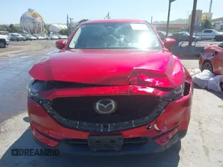 2019 Mazda CX-5 Touring with VIN JM3KFACM5K1516242, listed as a IAAI auction lot 42019803 with 113,953 mi miles. Bid and sale history available at carsss.com. Image 12.