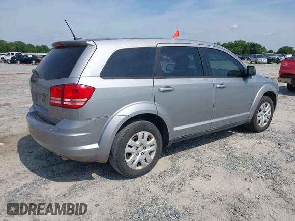 2015 Dodge Journey SE z VIN 3C4PDCAB0FT698674, wystawiony jako IAAI lot #42308994 z przebiegiem 97 640 mil mil oraz . Historia ofert i sprzedaży dostępna na DreamBid. Obrazek 4.