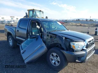 2015 Toyota Tacoma PreRunner z VIN 5TFJX4GN1FX041942, wystawiony jako IAAI lot #41448986 z przebiegiem Nie podano mil oraz . Historia ofert i sprzedaży dostępna na DreamBid. Obrazek 1.