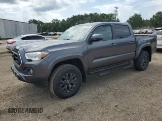 2021 Toyota Tacoma SR5 with VIN 5TFAZ5CN1MX105321, listed as a Copart auction lot 62648005 with 57,004 mi miles and Salvage title. Bid and sale history available at DreamBid. Image 1.