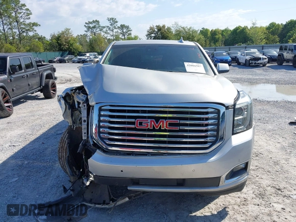2018 GMC Yukon XL SLT with VIN 1GKS1GKC6JR113510, listed as a IAAI auction lot 42006987 with 161,389 mi miles and . Bid and sale history available at carsss.com. Image 11.