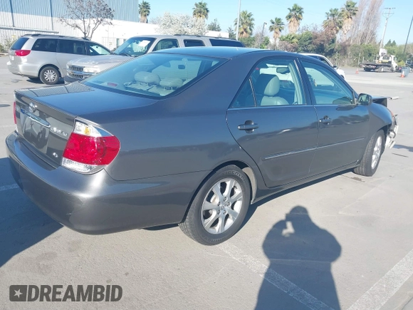 2005 Toyota Camry LE with VIN 4T1BF30K55U619313, listed as a IAAI auction lot 41854001 with 89,982 mi miles and . Bid and sale history available at DreamBid. Image 4.