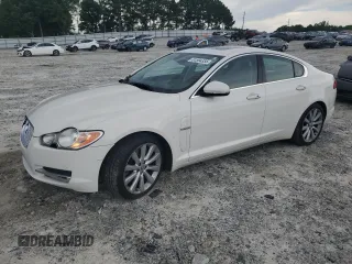 2010 Jaguar XF Premium Luxury with VIN SAJWA0GB6ALR64862, listed as a Copart auction lot 61594335 with 101,137 mi miles and Salvage title. Bid and sale history available at DreamBid. Image 1.