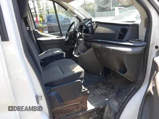 2022 Ford Transit Cargo z VIN 1FTBR3XG4NKA04700, wystawiony jako IAAI lot #42753263 z przebiegiem 80 467 mil mil oraz . Historia ofert i sprzedaży dostępna na DreamBid. Obrazek 5.