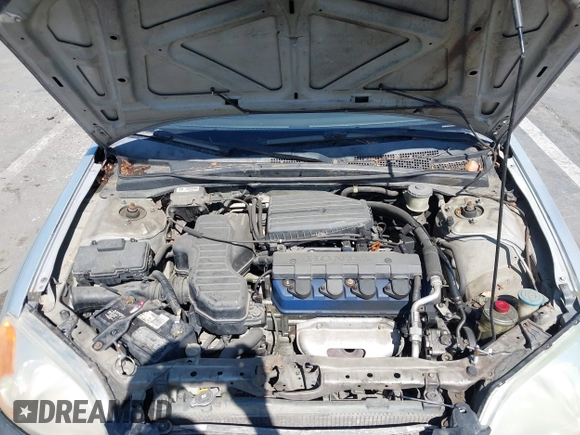 2003 Honda Civic LX with VIN 1HGEM22563L085882, listed as a IAAI auction lot 42227001 with 202,724 mi miles and . Bid and sale history available at DreamBid. Image 10.