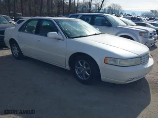 1999 Cadillac Seville Touring STS with VIN 1G6KY5494XU933090, listed as a IAAI auction lot 41292203 with 1 mi miles. Bid and sale history available at carsss.com. Image 1.