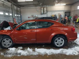 2012 Dodge Avenger SXT with VIN 1C3CDZCB0CN154559, listed as a IAAI auction lot 41618230 with 171,497 mi miles and . Bid and sale history available at DreamBid. Image 14.