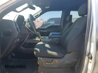 2018 Ford F-150 XL with VIN 1FTEW1CGXJFB40297, listed as a Copart auction lot 69642404 with 92,561 mi miles and Salvage title. Bid and sale history available at DreamBid. Image 7.