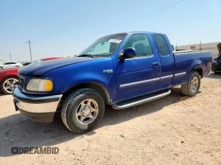 1998 Ford F-150 with VIN 1FTZX1728WKA22003, listed as a Copart auction lot 61235875 with 185,013 mi miles and Salvage title. Bid and sale history available at DreamBid. Image 1.