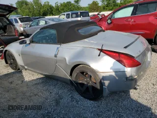 2005 Nissan 350Z Touring z VIN JN1AZ36A95M751810, wystawiony jako Copart lot #55104085 z przebiegiem 99 278 mil mil oraz Szkoda całkowita • Salvage title. Historia ofert i sprzedaży dostępna na DreamBid. Obrazek 2.