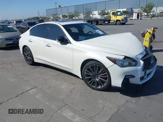 2021 Infiniti Q50 Red Sport 400 with VIN JN1FV7DR9MM880601, listed as a IAAI auction lot 42509477 with 28,202 mi miles and . Bid and sale history available at DreamBid. Image 1.
