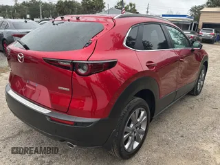 2024 Mazda CX-30 S Preferred z VIN 3MVDMBCM0RM614880, wystawiony jako Copart lot #86984534 z przebiegiem 1 967 mil mil oraz Czysty tytuł • Clean title. Historia ofert i sprzedaży dostępna na DreamBid. Obrazek 4.