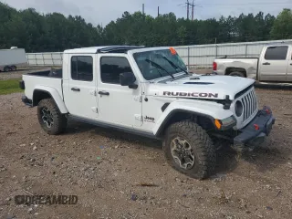 2020 Jeep Gladiator Rubicon с VIN 1C6JJTBG6LL102474, выставлен на аукционе Copart как лот 60377785 с пробегом 56 422 миль миль и Списание • Salvage title. История ставок и продаж доступна на DreamBid. Изображение 4.