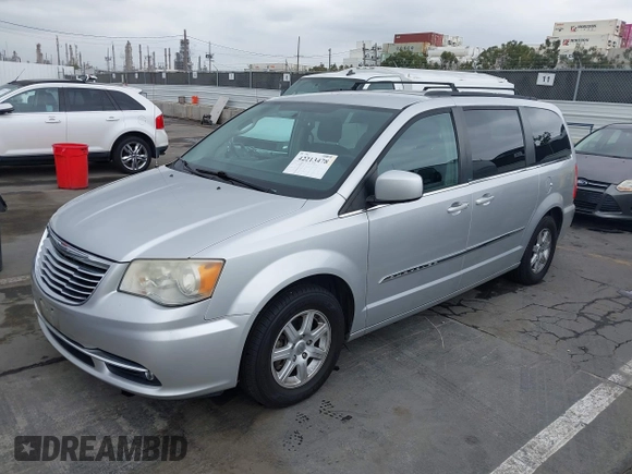 2011 Chrysler Town & Country Touring with VIN 2A4RR5DG2BR665177, listed as a IAAI auction lot 42213478 with 163,961 mi miles and . Bid and sale history available at DreamBid. Image 2.