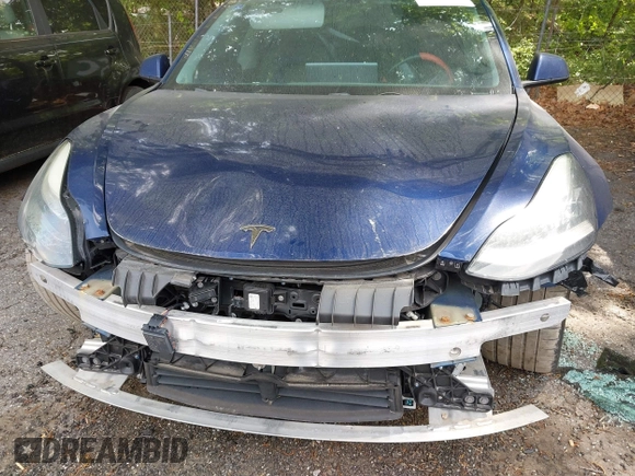 2018 Tesla Model 3 Long Range Battery with VIN 5YJ3E1EA2JF040914, listed as a IAAI auction lot 42120091 with 138,130 mi miles and . Bid and sale history available at DreamBid. Image 18.