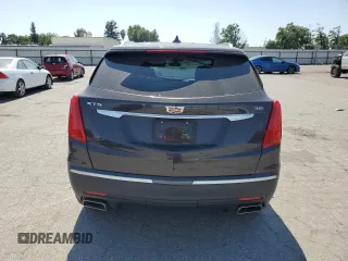 2018 Cadillac XT5 FWD with VIN 1GYKNARS5JZ155879, listed as a Copart auction lot 59568525 with 88,376 mi miles and Salvage title. Bid and sale history available at DreamBid. Image 6.