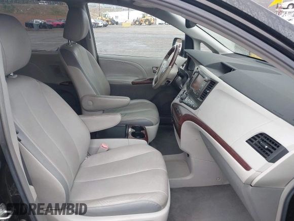 2011 Toyota Sienna XLE AAS with VIN 5TDYK3DC3BS004241, listed as a IAAI auction lot 41732296 with 173,527 mi miles and . Bid and sale history available at DreamBid. Image 5.
