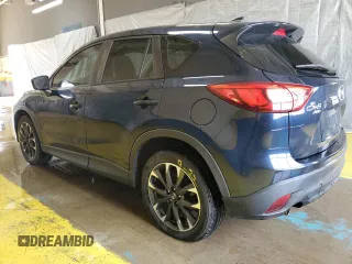 2016 Mazda CX-5 Grand Touring with VIN JM3KE4DY0G0813499, listed as a Copart auction lot 54174805 with 116,709 mi miles and Clean Title. Bid and sale history available at carsss.com. Image 2.