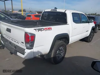 2022 Toyota Tacoma 4WD SR with VIN 3TMCZ5ANXNM528031, listed as a IAAI auction lot 41425832 with 39,760 mi miles. Bid and sale history available at carsss.com. Image 4.