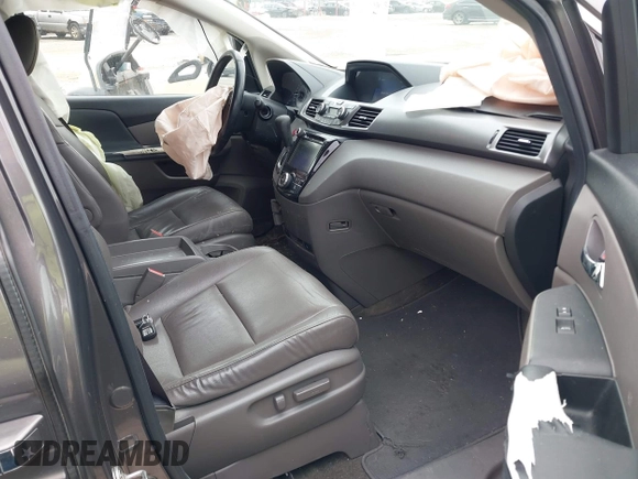 2014 Honda Odyssey EX-L with VIN 5FNRL5H62EB006346, listed as a IAAI auction lot 42061591 with 179,994 mi miles and . Bid and sale history available at DreamBid. Image 5.