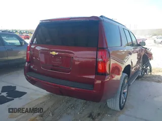 2018 Chevrolet Tahoe LT with VIN 1GNSCBKC5JR385935, listed as a IAAI auction lot 42116288 with 50,890 mi miles and . Bid and sale history available at DreamBid. Image 4.
