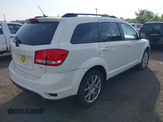 2012 Dodge Journey SXT with VIN 3C4PDCBG0CT206649, listed as a IAAI auction lot 42853311 with 146,686 mi miles and . Bid and sale history available at DreamBid. Image 4.