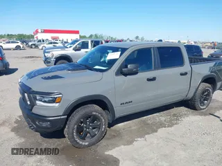 2023 Ram 1500 Rebel with VIN 1C6SRFLT2PN677577, listed as a IAAI auction lot 41991668 with 20,507 mi miles and . Bid and sale history available at DreamBid. Image 6.