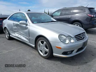 2004 Mercedes-Benz CLK-Class 5.0L with VIN WDBTJ75J34F071716, listed as a IAAI auction lot 41818093 with 100,142 mi miles. Bid and sale history available at carsss.com. Image 1.