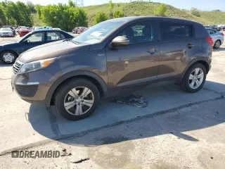 2012 Kia Sportage LX with VIN KNDPBCA25C7345191, listed as a Copart auction lot 58797215 with 87,229 mi miles and Clean title. Bid and sale history available at DreamBid. Image 1.