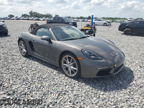 2023 Porsche Boxster with VIN WP0CA2A81PS205206, listed as a Copart auction lot 59809215 with 9,483 mi miles and Salvage title. Bid and sale history available at DreamBid. Image 4.