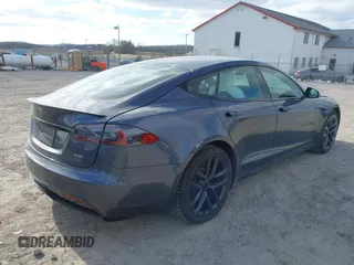 2021 Tesla Model S Plaid with VIN 5YJSA1E60MF455768, listed as a IAAI auction lot 41603504 with 27,398 mi miles. Bid and sale history available at carsss.com. Image 4.