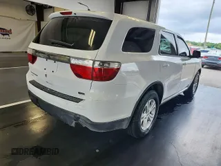 2013 Dodge Durango SXT with VIN 1C4RDJAG8DC671689, listed as a IAAI auction lot 42743958 with 160,950 mi miles and . Bid and sale history available at DreamBid. Image 26.