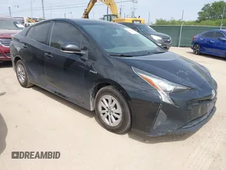2016 Toyota Prius Two z VIN JTDKBRFU4G3509129, wystawiony jako IAAI lot #42321562 z przebiegiem 246 582 mil mil oraz . Historia ofert i sprzedaży dostępna na DreamBid. Obrazek 1.