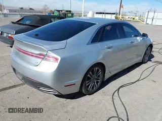 2014 Lincoln MKZ with VIN 3LN6L2GK2ER817686, listed as a IAAI auction lot 41505907 with 318,636 mi miles. Bid and sale history available at carsss.com. Image 4.
