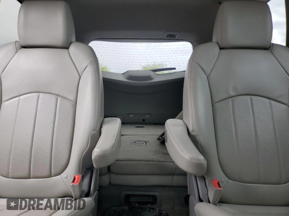 2016 Chevrolet Traverse LTZ z VIN 1GNKVJKD5GJ198294, wystawiony jako Copart lot #56007175 z przebiegiem 106 561 mil mil oraz Czysty tytuł • Clean title. Historia ofert i sprzedaży dostępna na DreamBid. Obrazek 10.