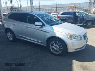 2016 Volvo XC60 T5 Drive-E Premier z VIN YV440MDK2G2836800, wystawiony jako IAAI lot #42386640 z przebiegiem 101 809 mil mil oraz . Historia ofert i sprzedaży dostępna na DreamBid. Obrazek 1.
