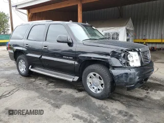 2004 Cadillac Escalade z VIN 1GYEK63N74R232309, wystawiony jako Copart lot #53099795 z przebiegiem 222 698 mil mil oraz Szkoda całkowita • Salvage title. Historia ofert i sprzedaży dostępna na DreamBid. Obrazek 4.