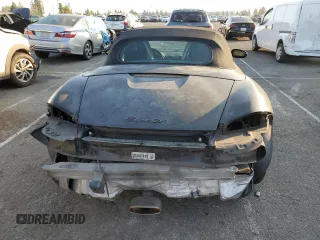 2005 Porsche Boxster z VIN WP0CA29885U711749, wystawiony jako Copart lot #84301684 z przebiegiem 272 856 mil mil oraz Szkoda całkowita • Salvage title. Historia ofert i sprzedaży dostępna na DreamBid. Obrazek 6.